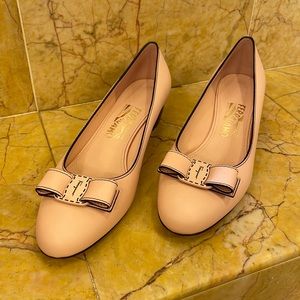 Ferragamo low heel shoe with bow detail. Never worn